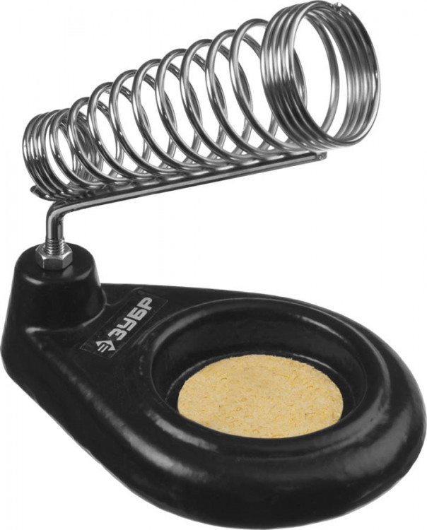 Подставка для паяльника литая ЗУБР 55464 применяется для безопасности при паяльных работах. Направляющая подставки сделана так